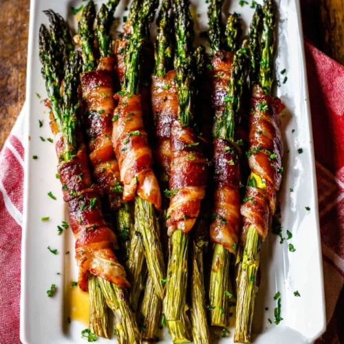 Bacon-Wrapped Asparagus: Irresistibly Crispy Delight 1 Delicious bacon-wrapped asparagus appetizer for gatherings.