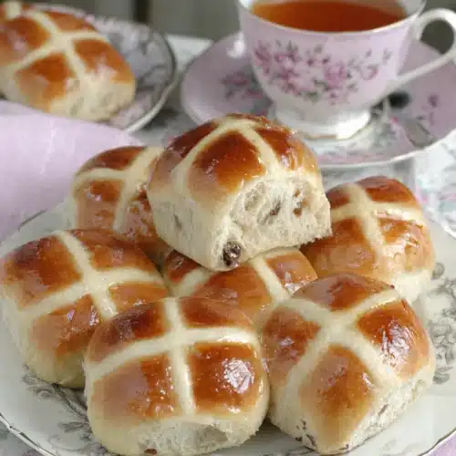 Mrs. Rabbit's Hot Cross Buns: A Delightful Treat 1 Mrs. Rabbit's hot cross buns on a floral plate