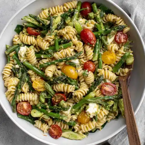 Spring Pasta Salad with Honey Mustard Dressing: A Refreshing Delight 1 Spring pasta salad with honey mustard dressing and fresh veggies.