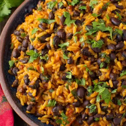 Delicious Mexican Black Beans: A Quick Delight 1 Savory Mexican black beans dish with rice and spices.
