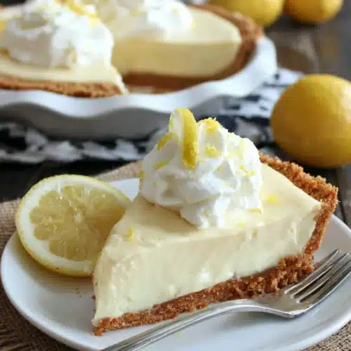 Paula Deen Lemon Pie: A Refreshingly Easy Delight 1 Paula Deen lemon pie topped with whipped cream and lemon zest
