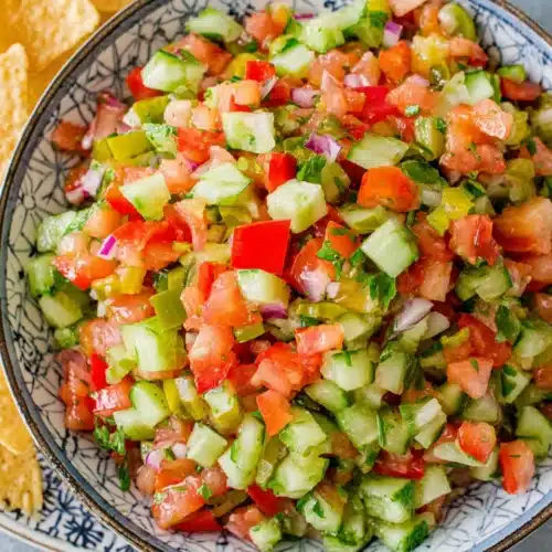 Pico De Gallo Fresh: A Zesty and Vibrant Delight 1 Zesty pico de gallo fresh with dill pickles and veggies.