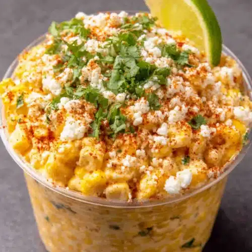 Mexican Street Corn: Easy Elote Recipe You'll Love 1 Mexican street corn elote in a cup with Cotija cheese and cilantro