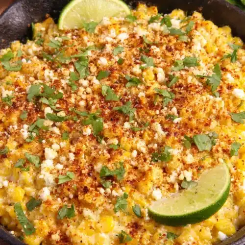 Skillet Mexican Street Corn: A Flavorful Delight 1 Skillet Mexican street corn with lime, cheese, and cilantro