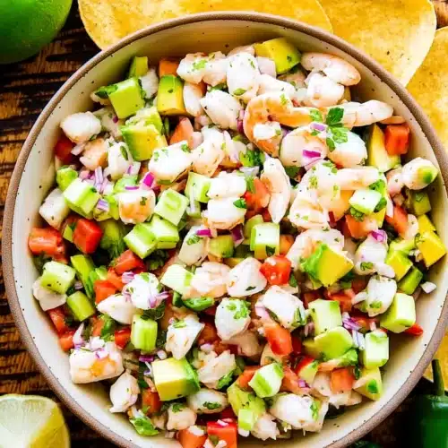 Avocado Shrimp Ceviche: A Refreshingly Easy Delight 1 Avocado shrimp ceviche with tortilla chips and jalapeños