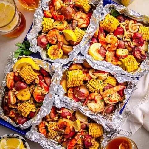 Cajun Shrimp Boil Foil Packs: A Flavorful Family Favorite 1 Cajun shrimp boil foil packs with shrimp, corn, potatoes, and sausage