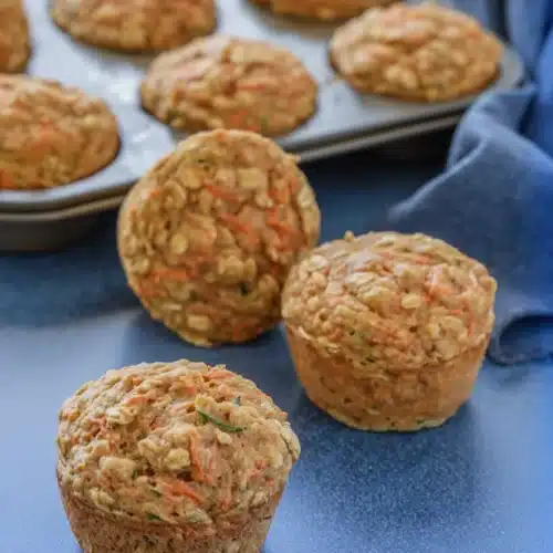 Delicious Carrot Zucchini Muffins: A Healthy Snack 2 Moist carrot zucchini muffins with oats and vegetables, fresh from the oven