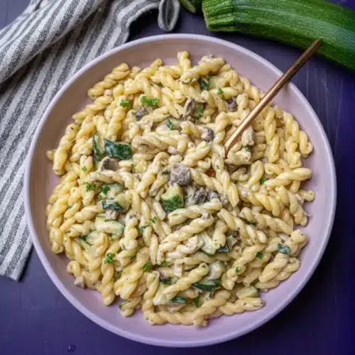 Crispy Courgette and Mushroom Pasta Recipe for Quick Dinners 2 Creamy courgette and mushroom pasta with gemelli noodles and fresh parsley