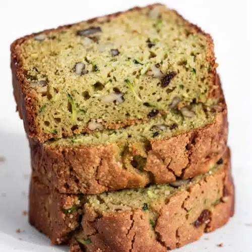Old Fashioned Moist Zucchini Bread: A Delightful Classic 2 Old fashioned moist zucchini bread with walnuts, sliced and stacked