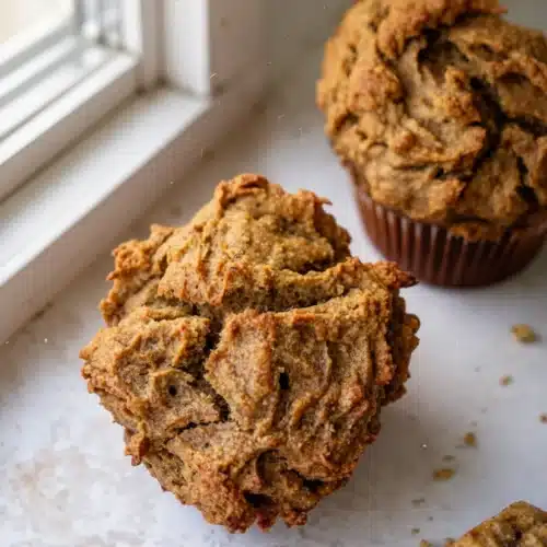 AIP Banana Bread Muffins: A Delightful, Moist Treat 1 AIP banana bread muffins on white surface, golden brown and moist